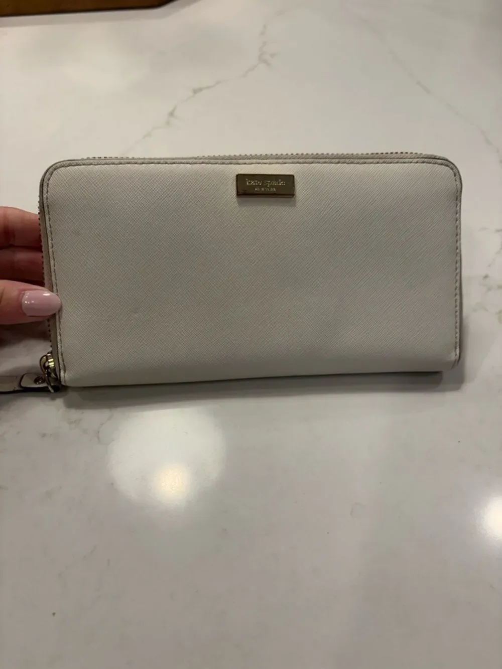 Kate Spade New York Cream Zip Wallet with Gold Plaque